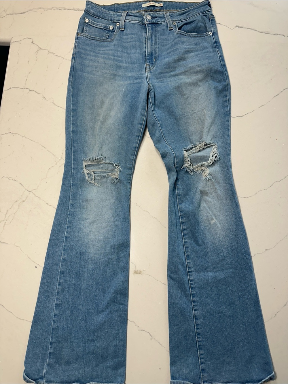 Levi's Distressed Light Blue Flare Jeans